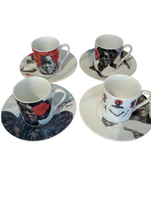 Beautiful set of four plates ans cups from famous Dominican painter Jorge Severino